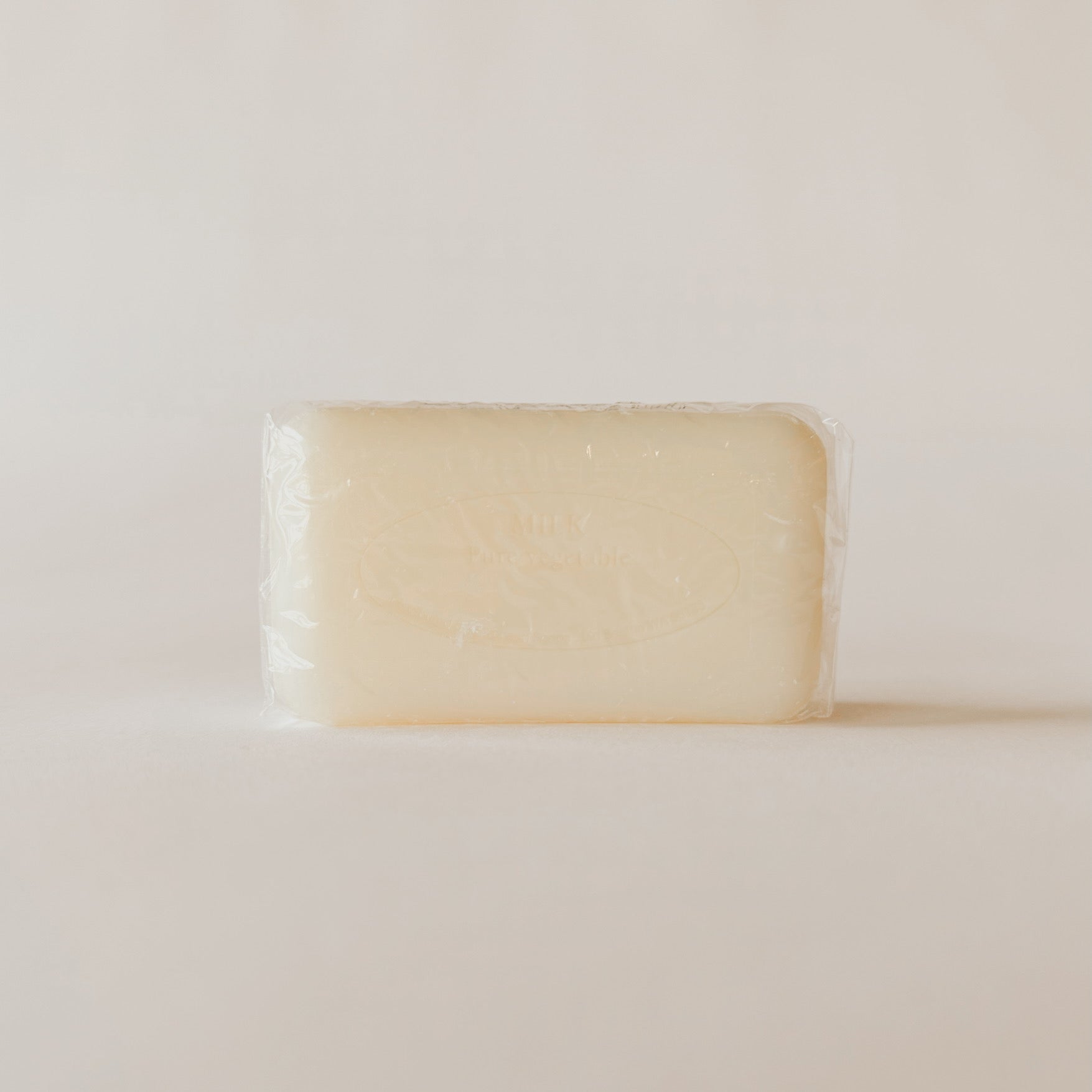 Pre de Provence Everyday French Soap Lait by Grace & Company ltd, rectangular bar in clear plastic on a light background.