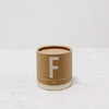 packaging for falcon enamelware's enamel cup with scented candle inside
