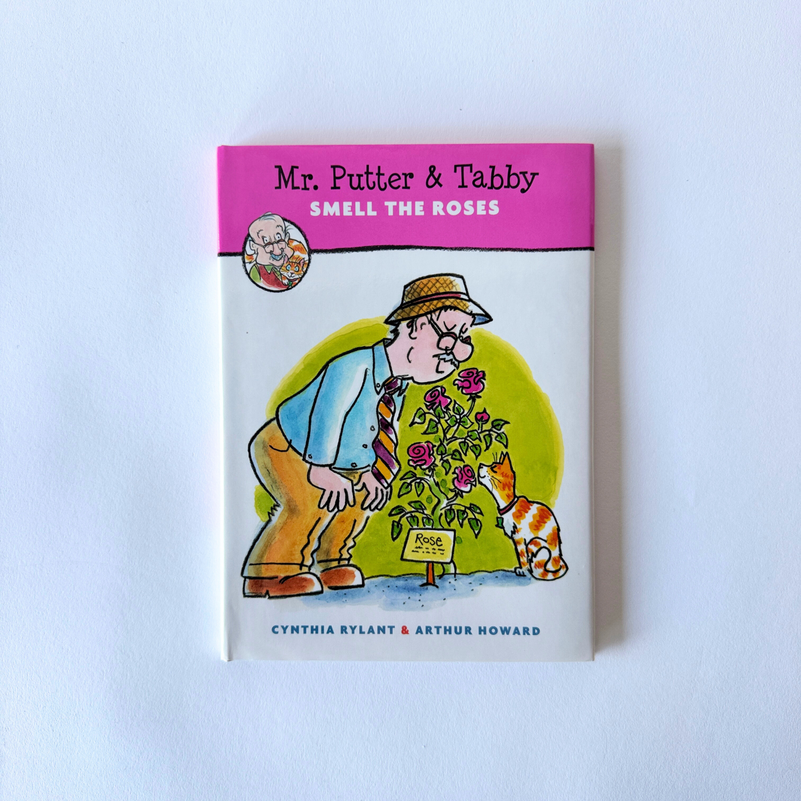 Mr. Putter & Tabby Smell The Roses by Cynthia Rylant & Arthur Howard, from Grace & Company ltd, features a man and his cat.