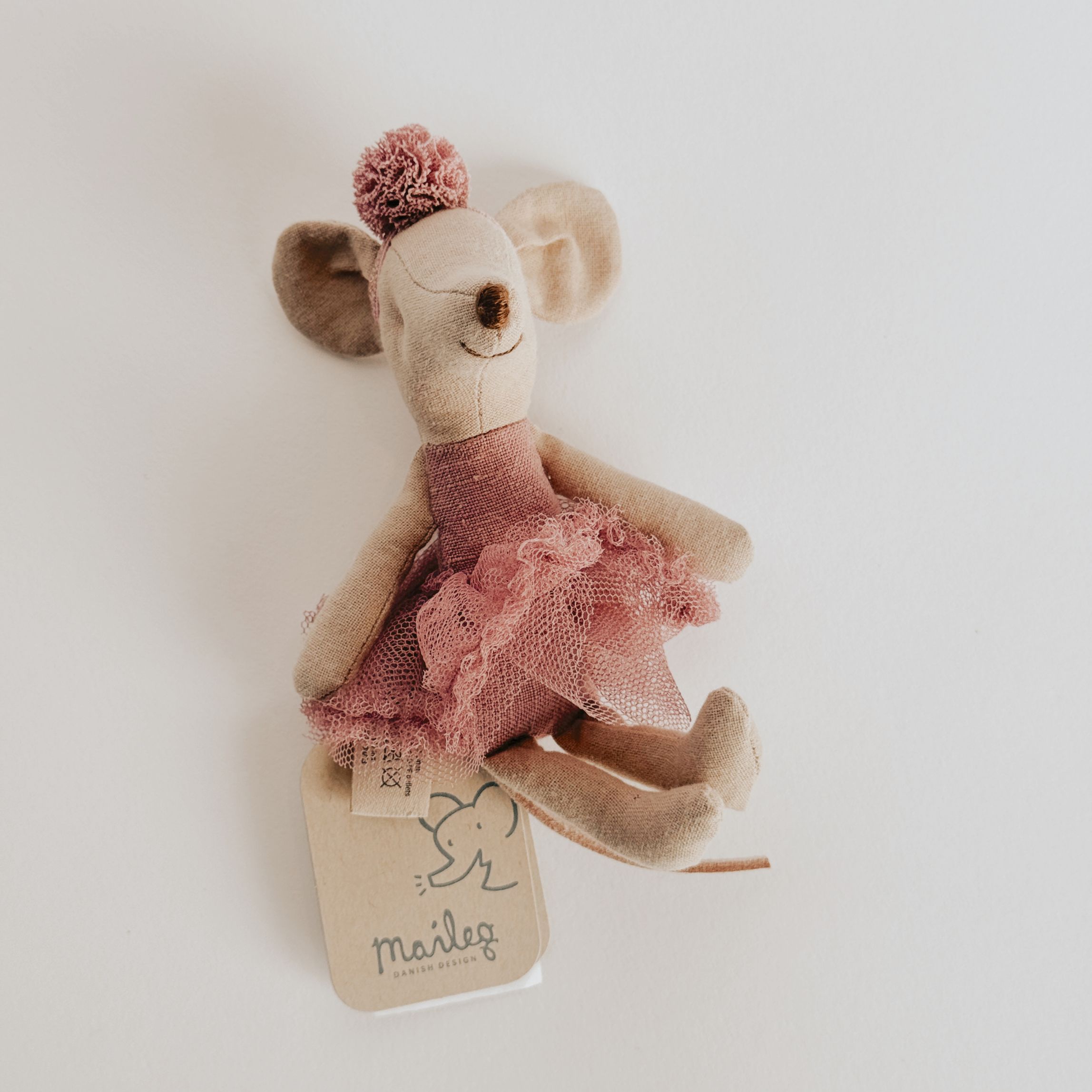 Maileg - Little Sister Ballerina Pompom Mouse by Grace & Company, dressed in pink with pom-pom hat on white background.