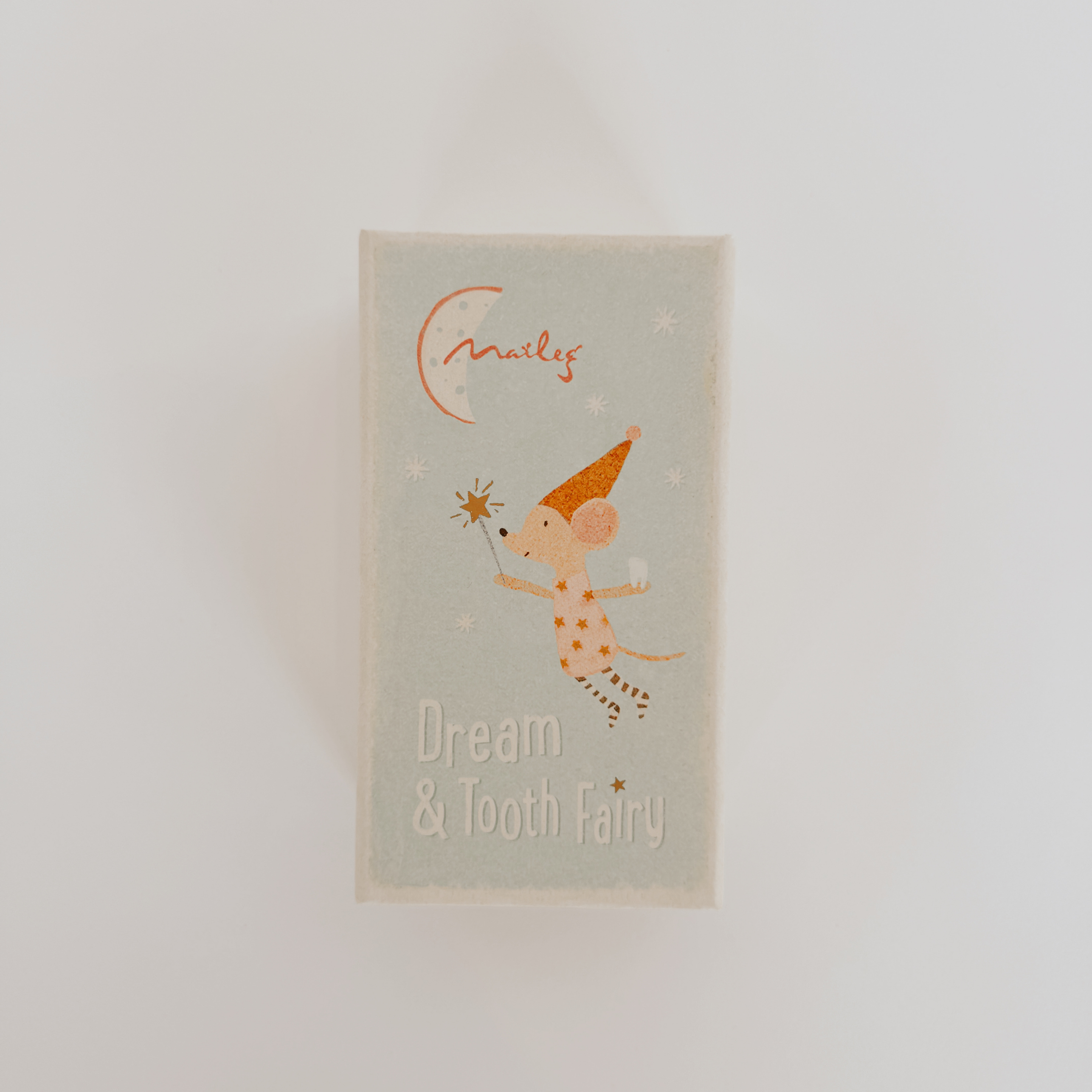 A small box labeled Grace & Company Maileg - Toothfairy Mouse, featuring an illustrated mouse in a hat.