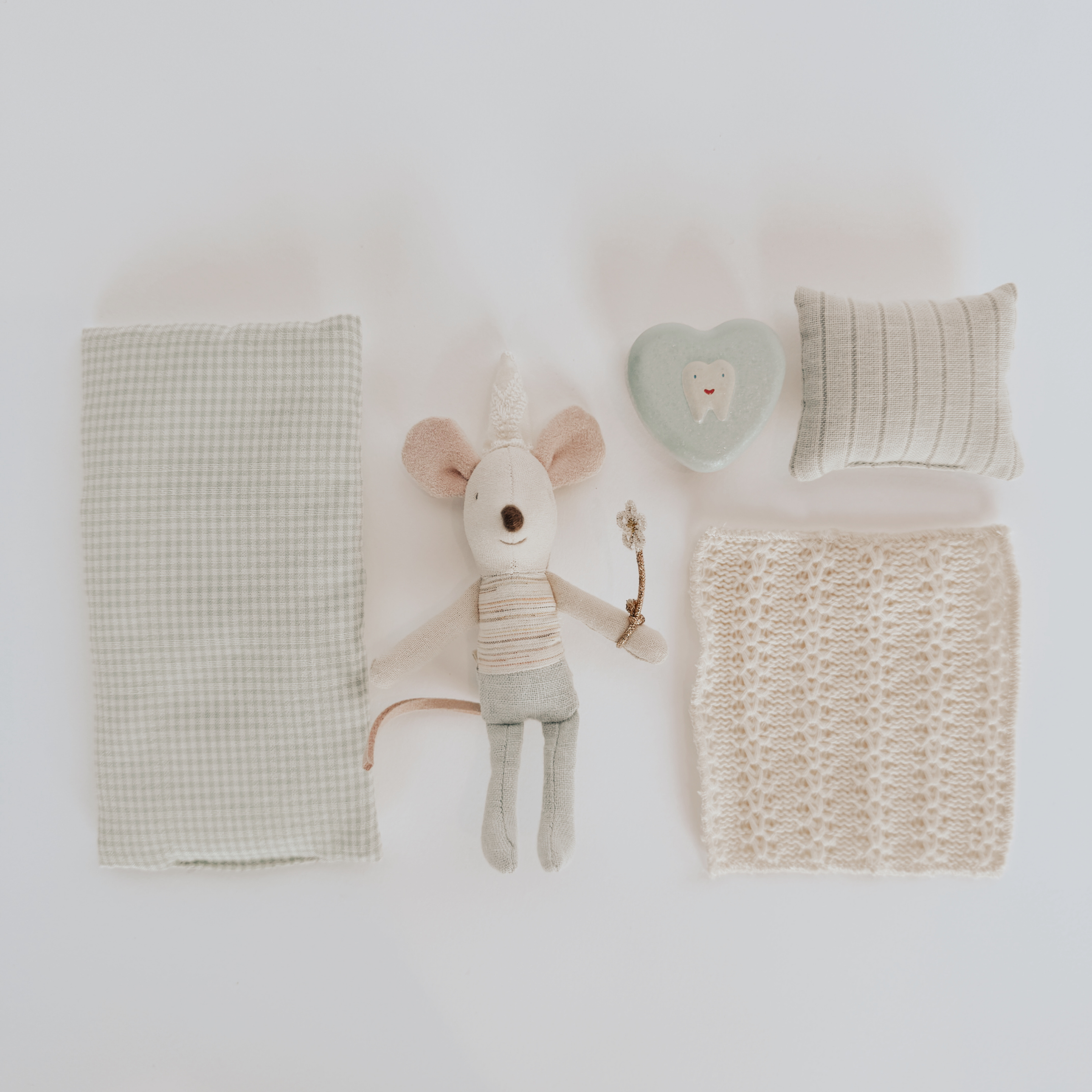 Grace & Company Maileg - Toothfairy Mouse with wand, pillow, blanket, lace mat & heart tooth dish on white background.