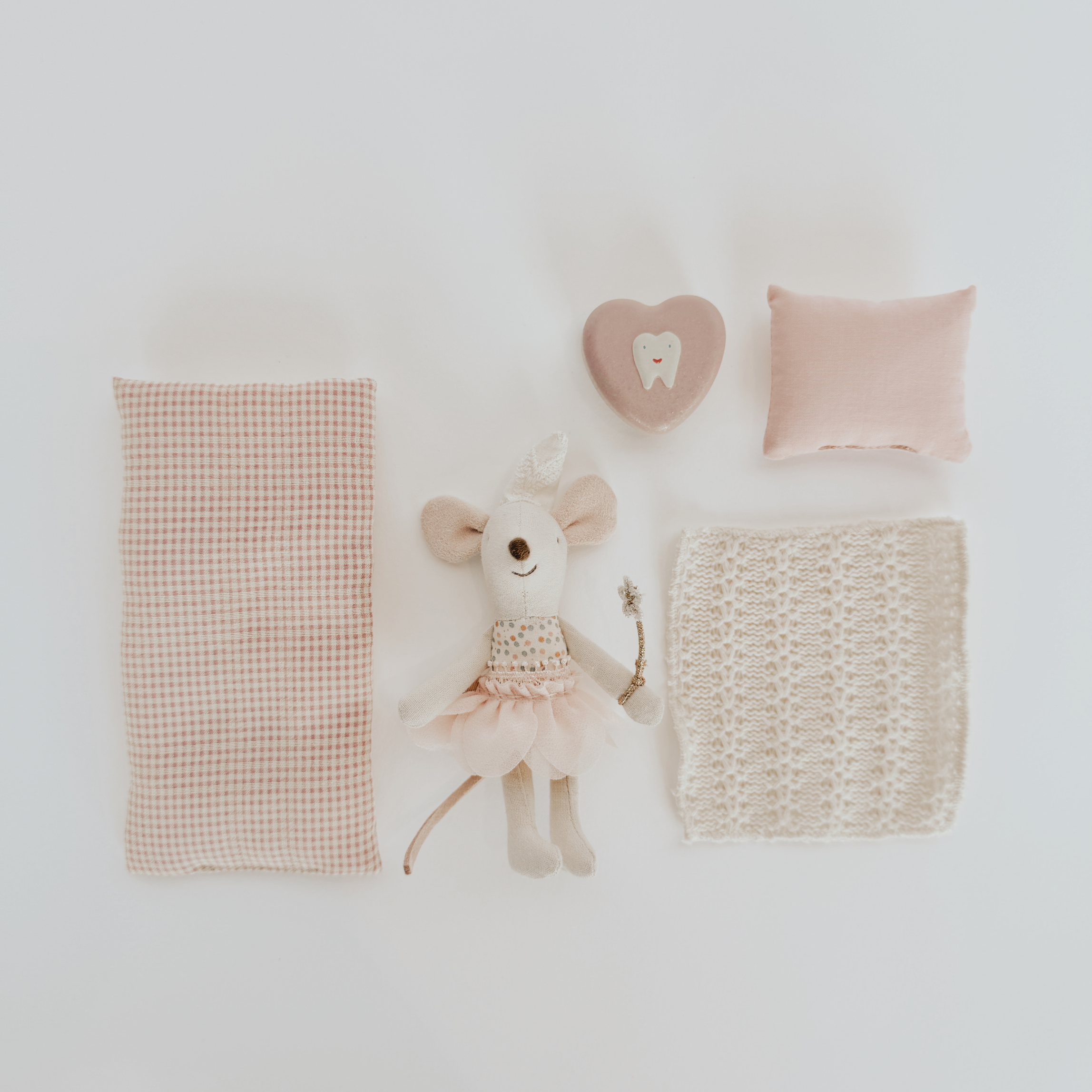 Grace & Company Maileg - Toothfairy Mouse with pink pillows, crocheted blanket, and heart box on white background.