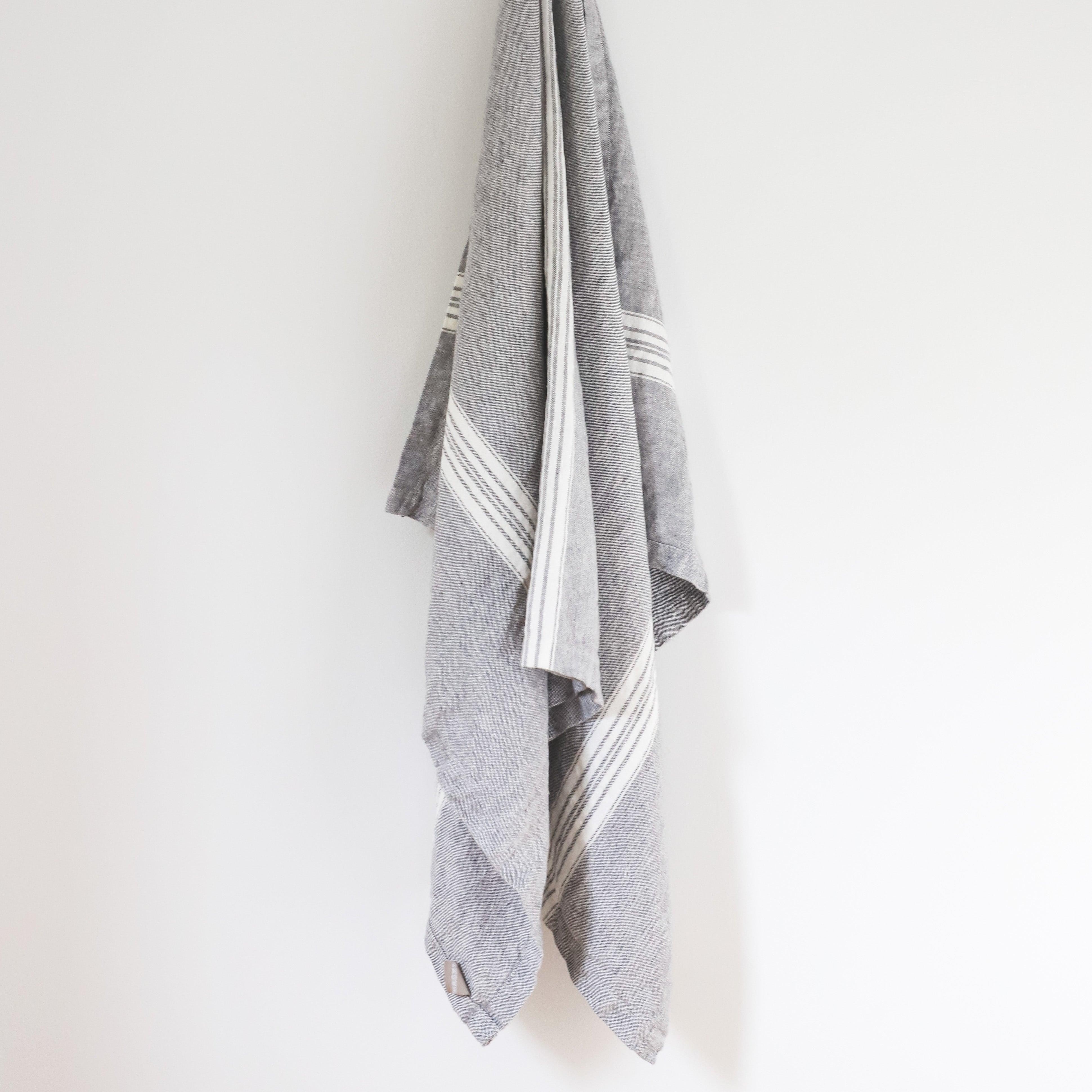 A Linen Way - Maison Picnic Cloth by Grace & Company hangs on a white wall.