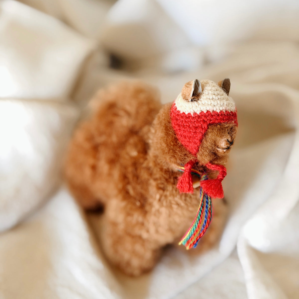 Holiday Stuffie - Alpaca in a knitted hat
