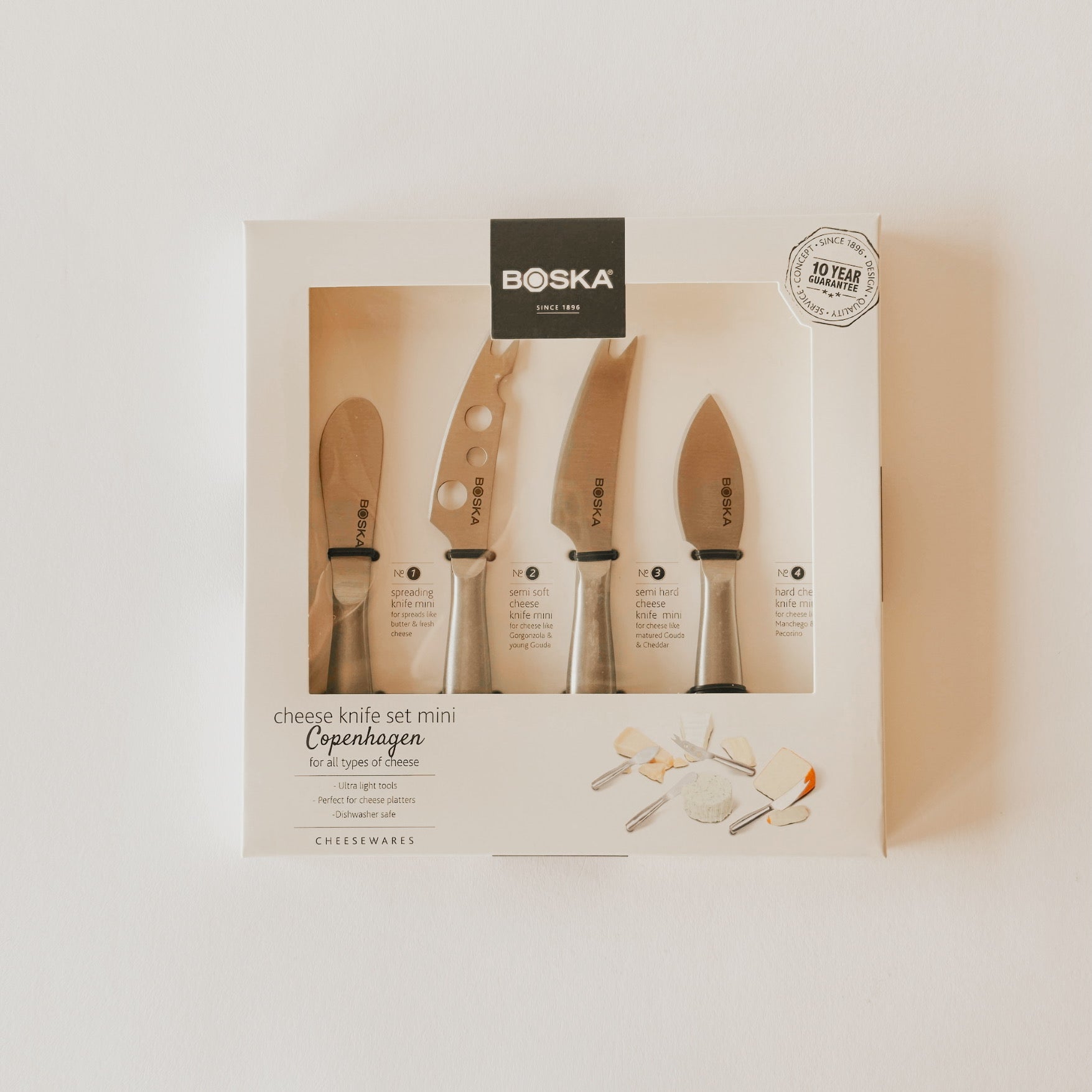 The BOSKA Cheese Knives Set Mini Copenhagen by Grace & Company ltd includes 4 knives in a sleek white box.