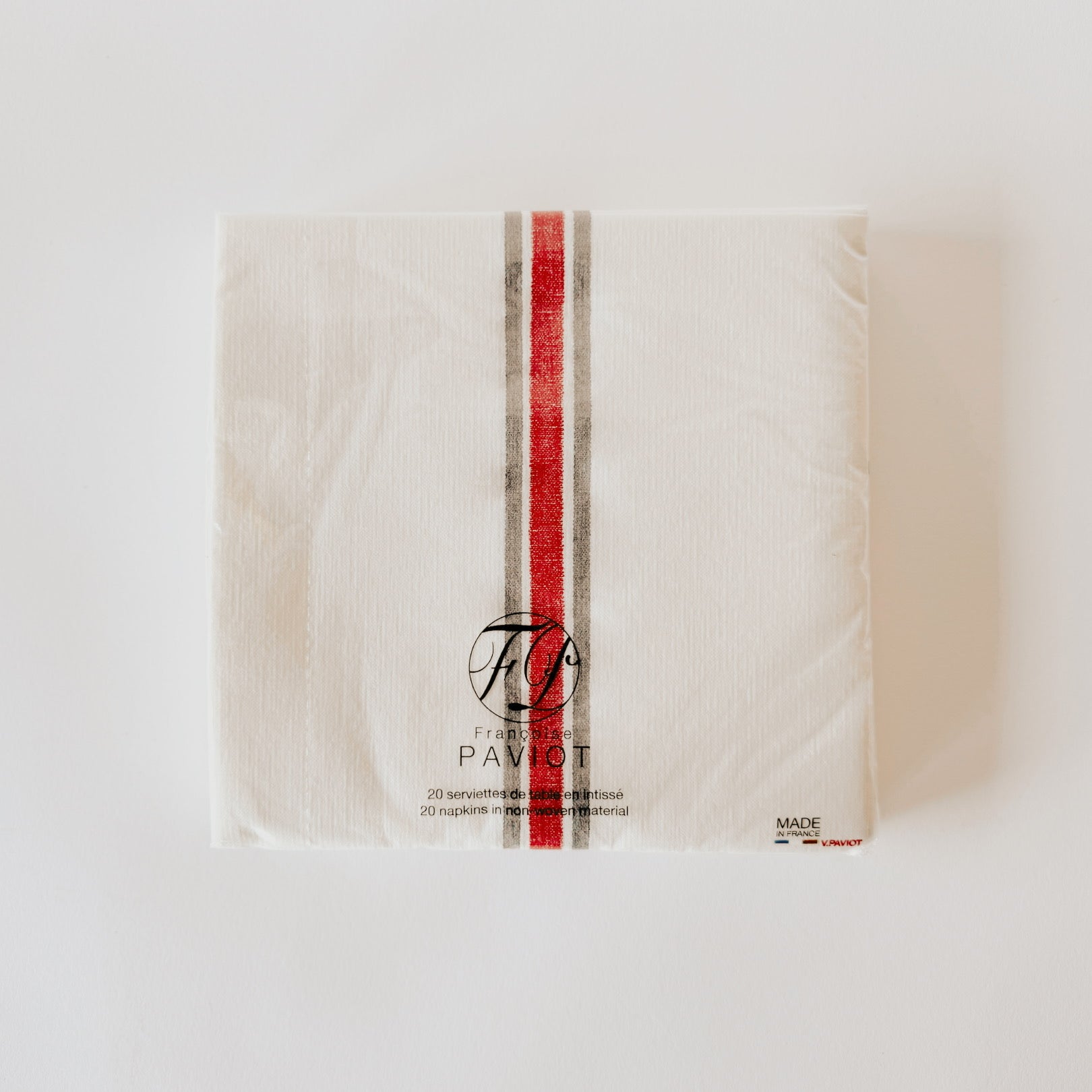 A pack of Paviot - Dinner Napkins by Grace & Company, white with red and gray stripes, on a white background.