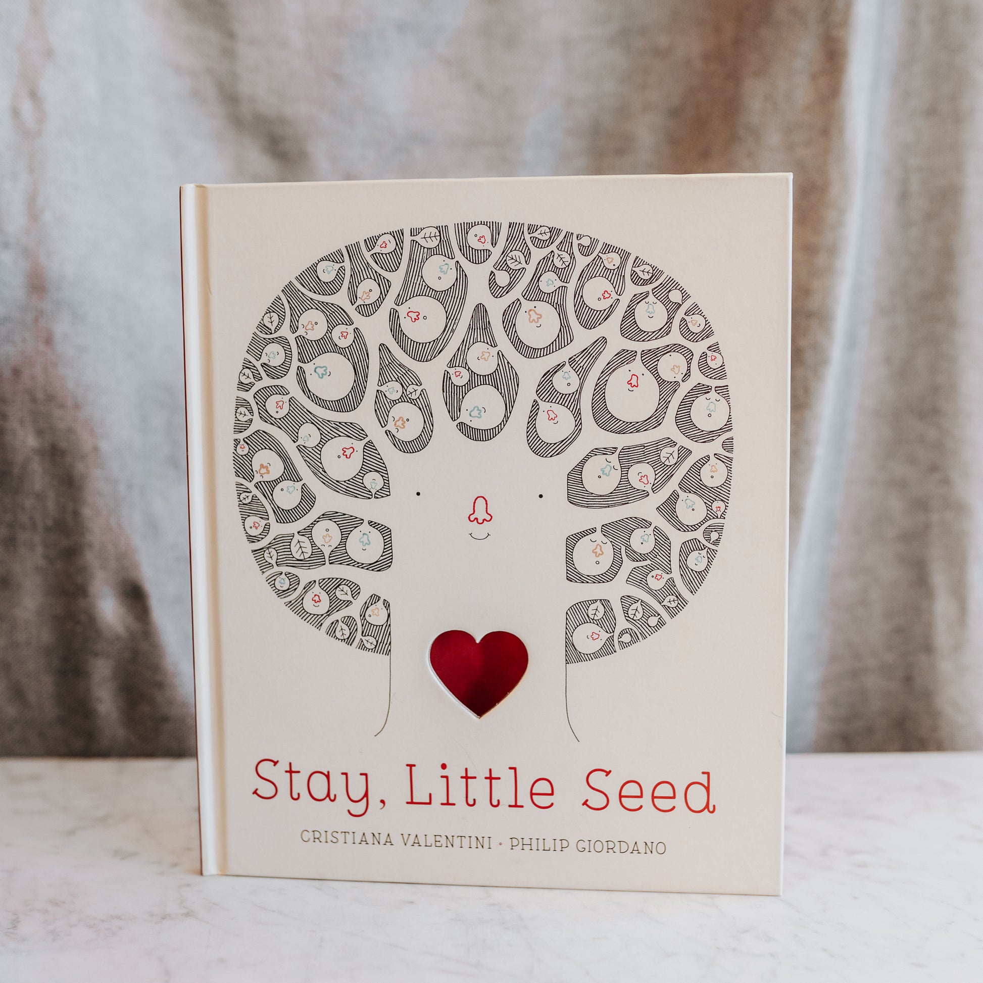 Stay Little Seed by Christina Valentini & Philip Giordano, Grace and Company Ltd, upright on a white surface.