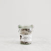 glass jar of aromatic mushroom flavored savory finishing salts