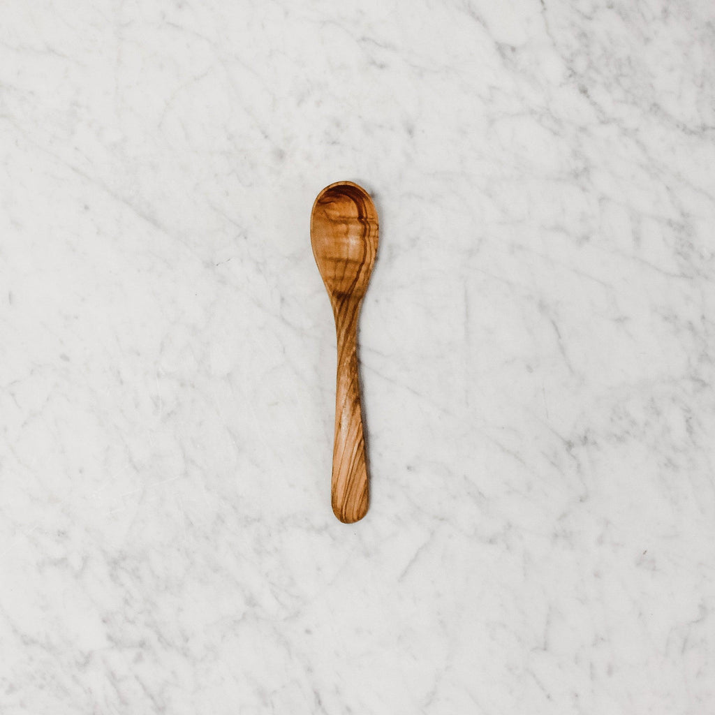 top view of a 7" olive wood spoon