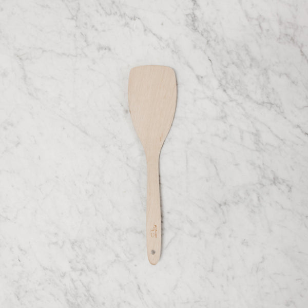 above view of wooden curved spatula