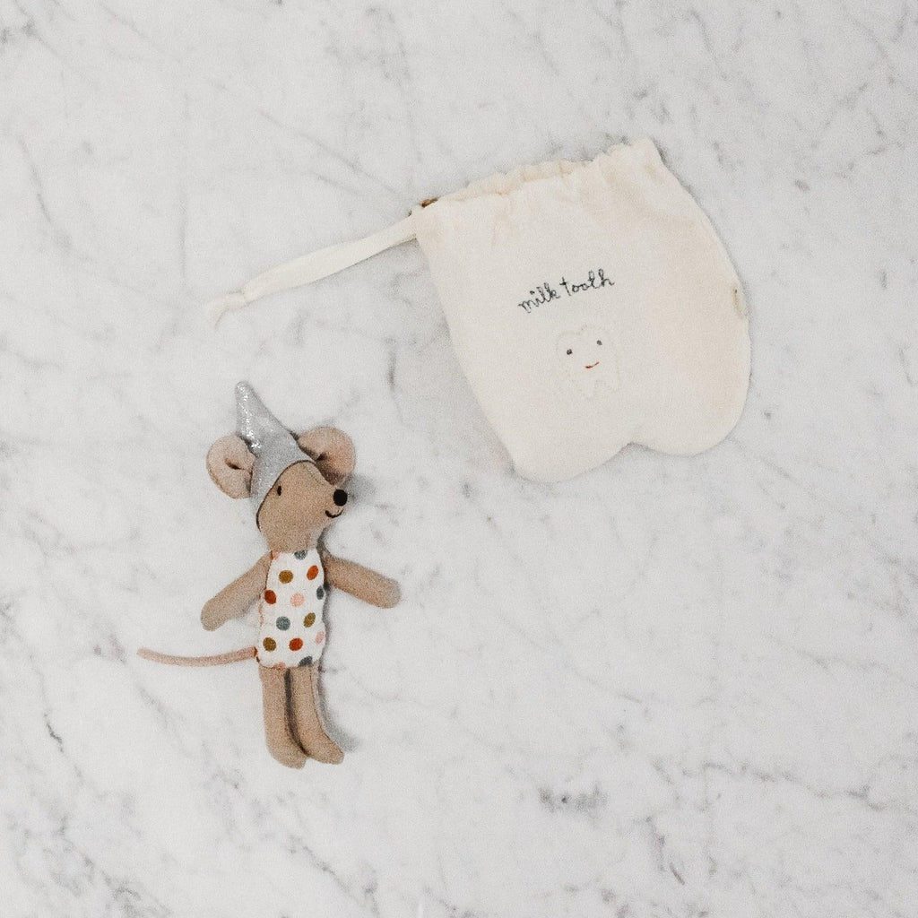 Maileg tooth fairy mouse in a tooth-shaped draw string bag that is embroidered with the words "milk teeth"