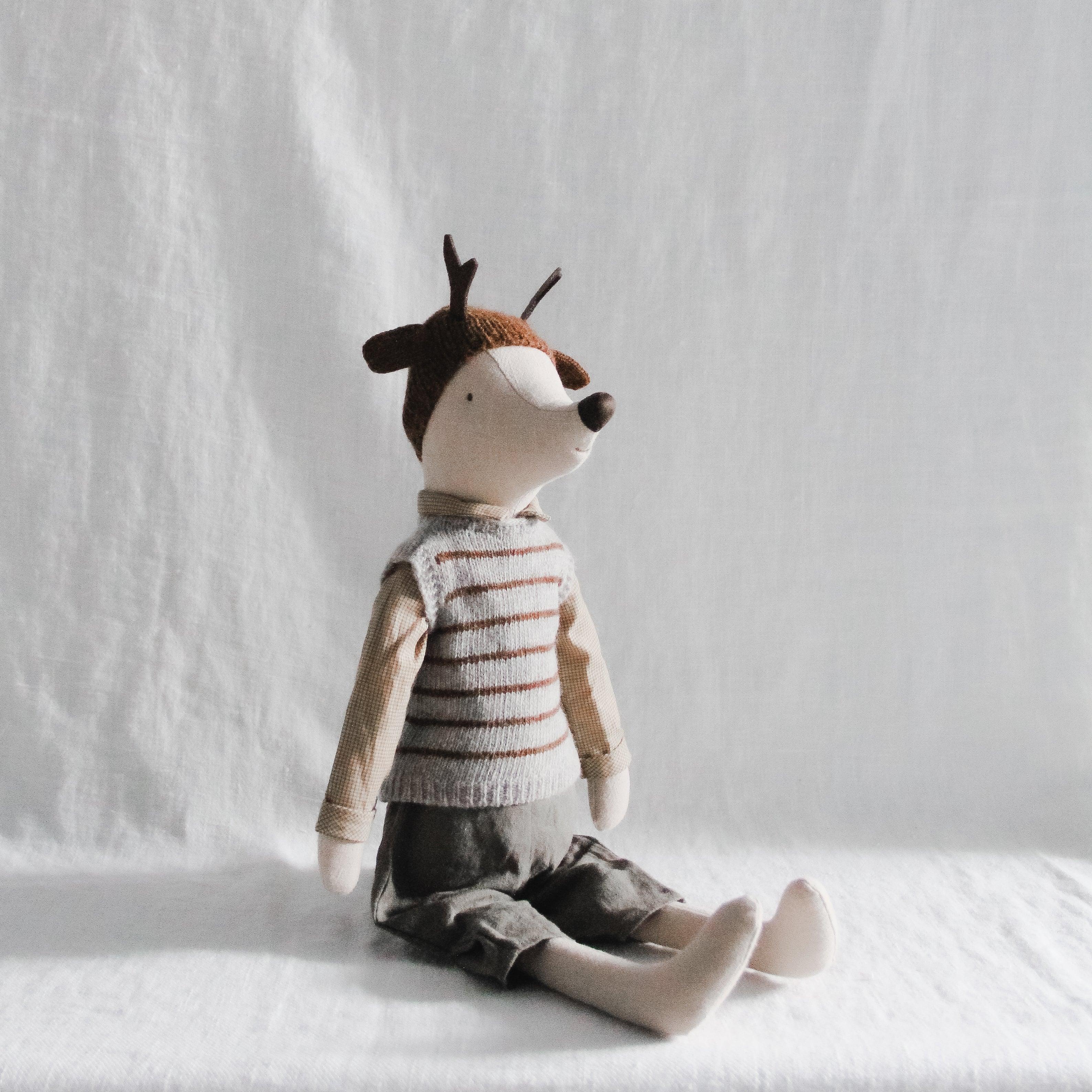 Grace & Company Maileg - Maxi Mouse Boy in striped sweater and pants sits against a white fabric background.