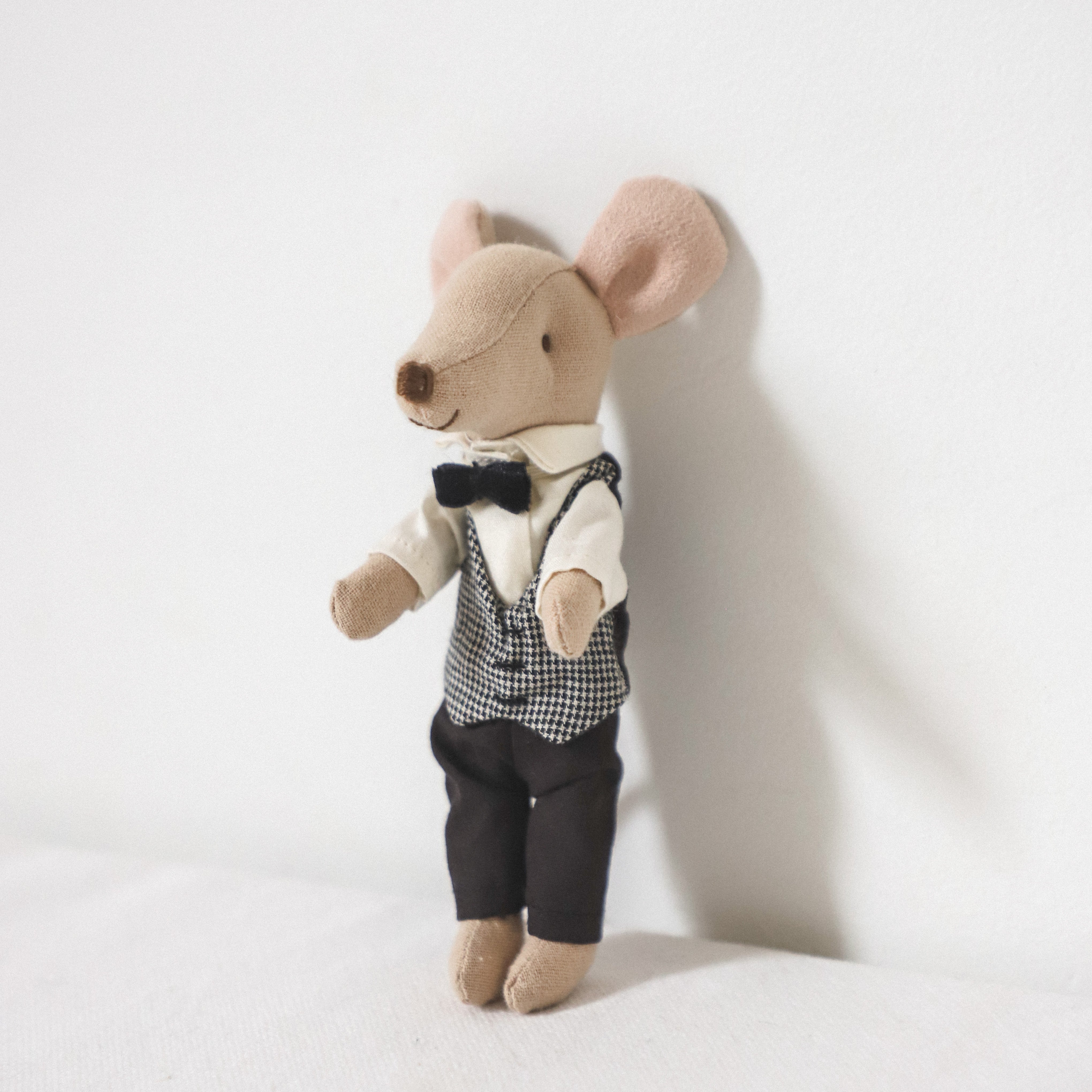 Maileg - Royal Staff by Grace and Company Ltd: a stuffed mouse toy in checkered vest, bow tie, and black pants.
