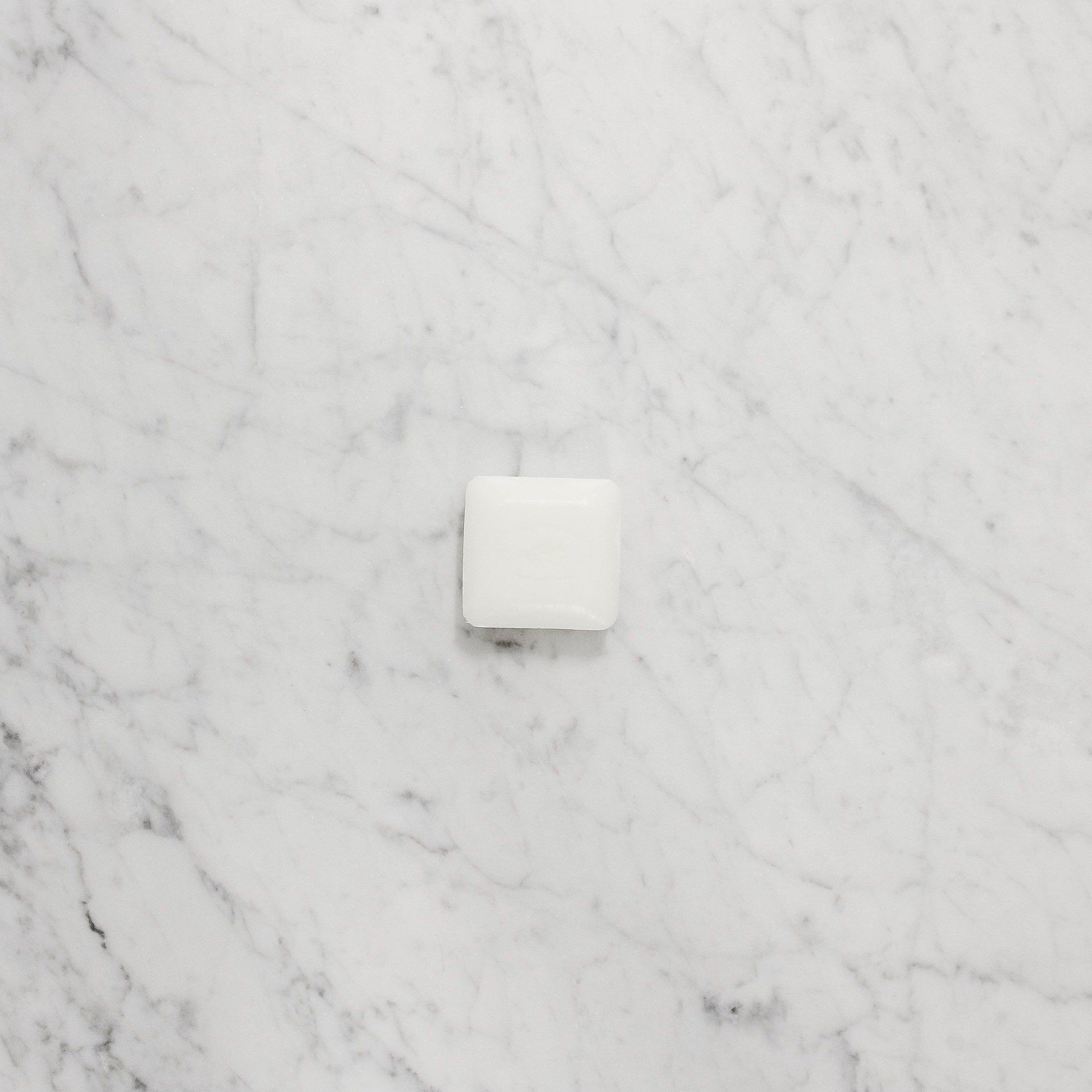 Pre de Provence Sea Salt Mini Soap by Grace & Company Ltd on a white marble surface.