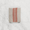 folded linen way maison tea towel natural with red stripe