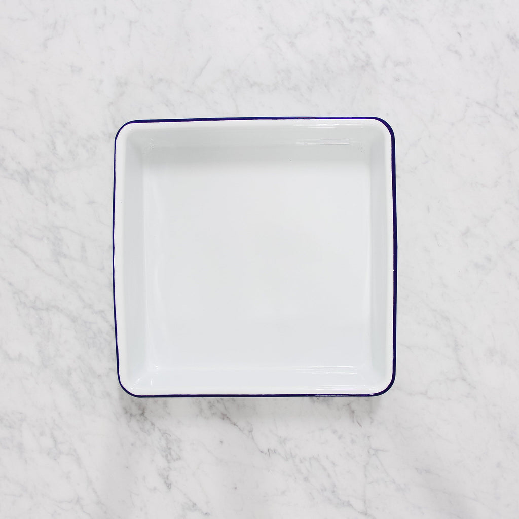 white enamel square baking tray with blue rim by Falcon enamelware