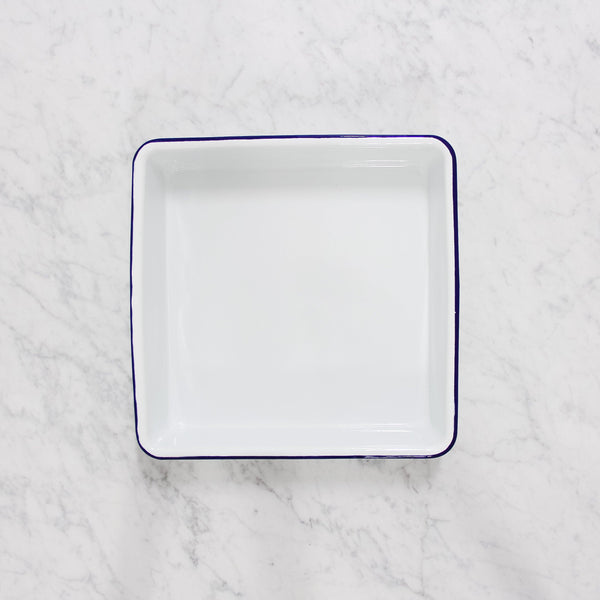 white enamel square baking tray with blue rim by Falcon enamelware