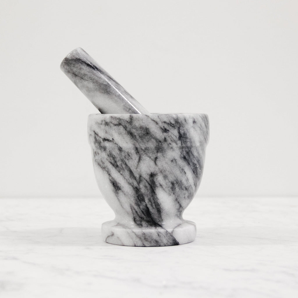 tall grey marble mortar and pestle