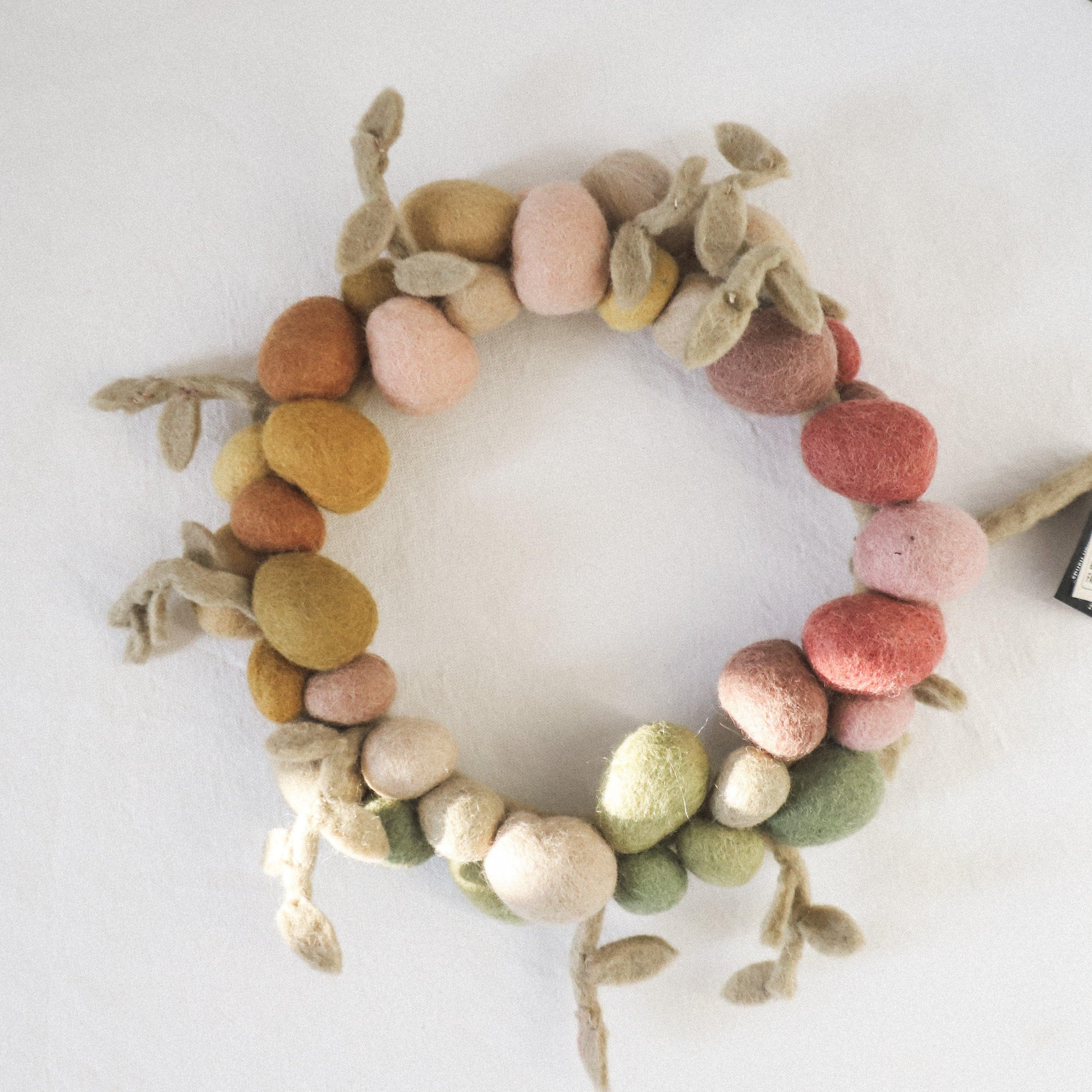 The Scandi - Easter Egg Felted Wreath by Grace and Company Ltd features pastel felted balls and leaves.