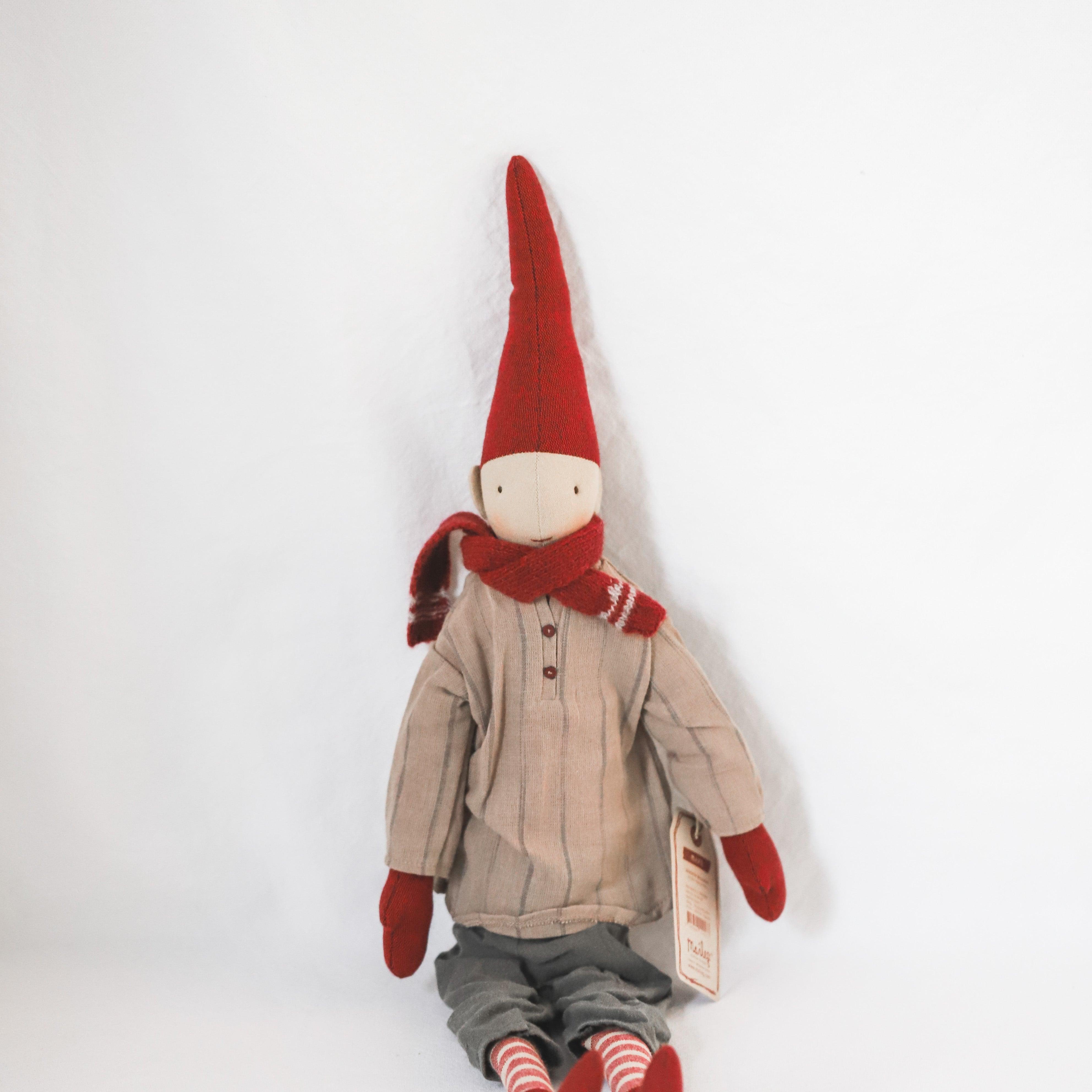 Maileg - Pixy Collection Christmas doll by Grace & Company wears a red hat, scarf, mittens, and striped socks.